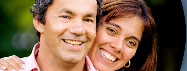 man and woman smiling